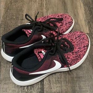 Pink nike running shoes